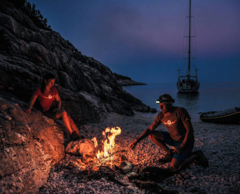 Daniela Bärnthaler and Christian Schiester runnung and sailing at the Ionian Sea in Greece on July 2016 Beach Fire
