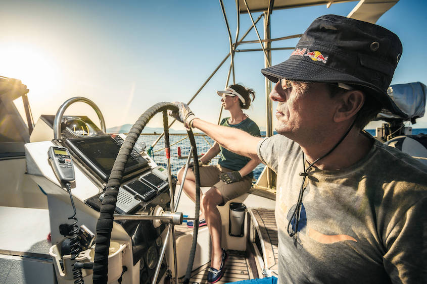 Daniela Bärnthaler and Christian Schiester runnung and sailing at the Ionian Sea in Greece on July 2016